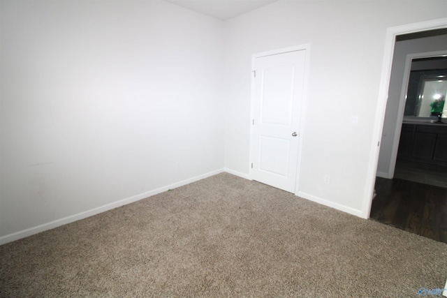 interior space with dark carpet