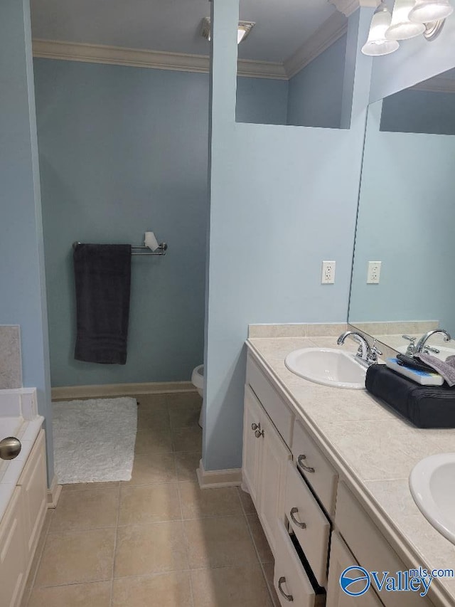 full bath with crown molding, double vanity, toilet, a sink, and tile patterned flooring