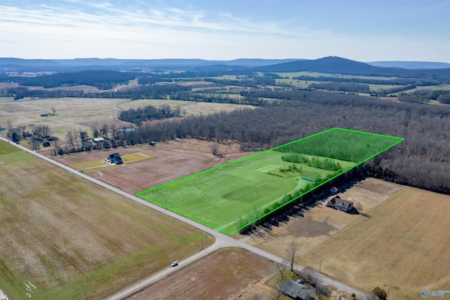 aerial view with a mountain view and a rural view