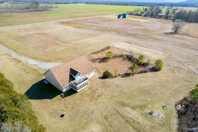 birds eye view of property featuring a rural view