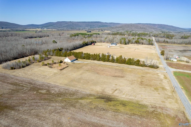 birds eye view of property featuring a mountain view and a rural view