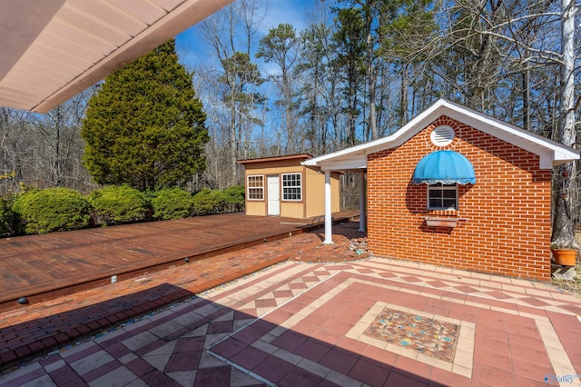 view of patio featuring a wooden deck