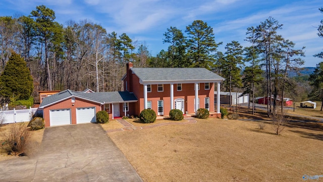 view of front of home featuring a garage and a porch