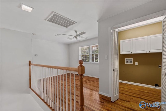 hallway featuring hardwood / wood-style floors