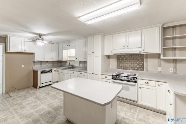 kitchen featuring under cabinet range hood, white cabinetry, white appliances, light floors, and ceiling fan