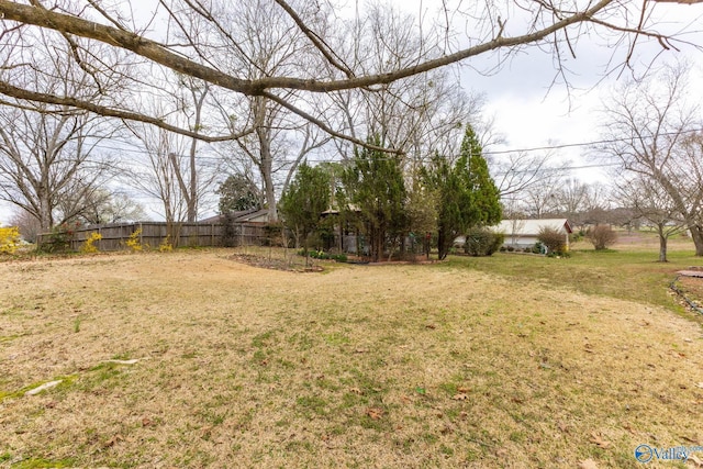 view of yard featuring fence