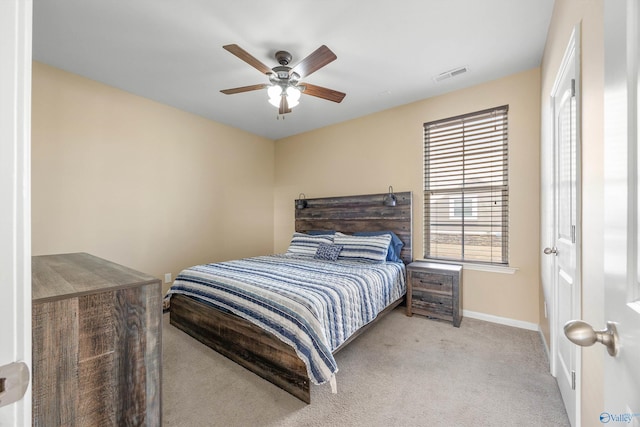 carpeted bedroom featuring ceiling fan