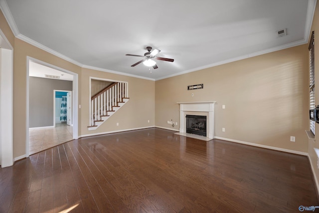 unfurnished living room with ornamental molding, dark hardwood / wood-style floors, and ceiling fan