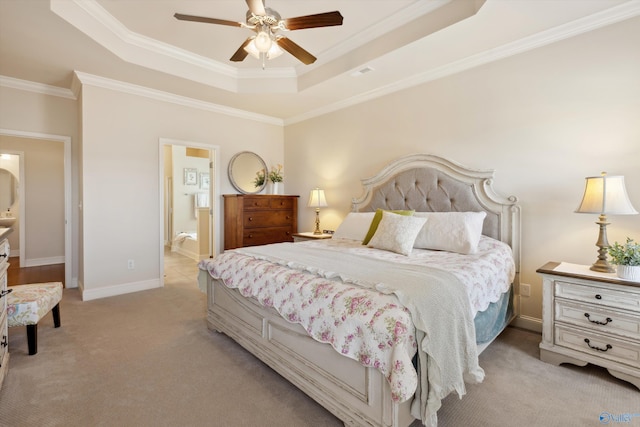 bedroom with visible vents, baseboards, light colored carpet, a tray ceiling, and ornamental molding