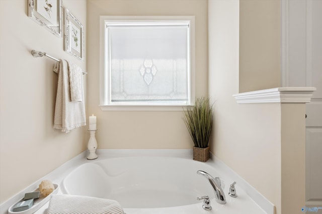 bathroom with a garden tub