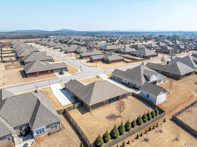 birds eye view of property with a residential view