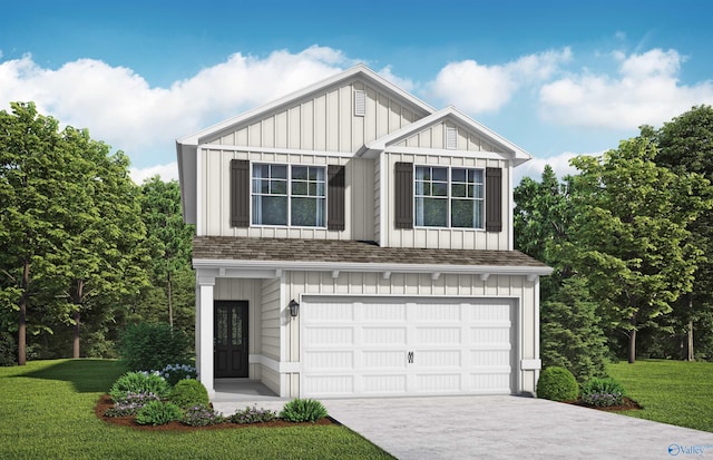 view of front of property featuring a garage and a front yard