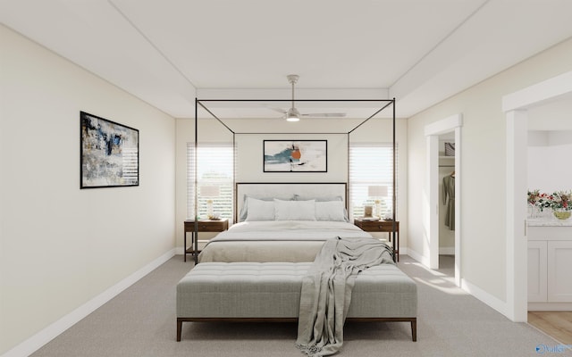 bedroom featuring multiple windows and light carpet