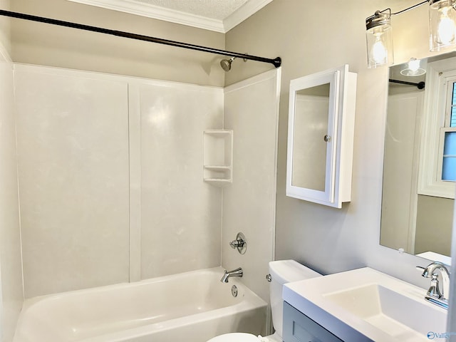 full bathroom featuring toilet, a textured ceiling, ornamental molding, shower / bathtub combination, and vanity