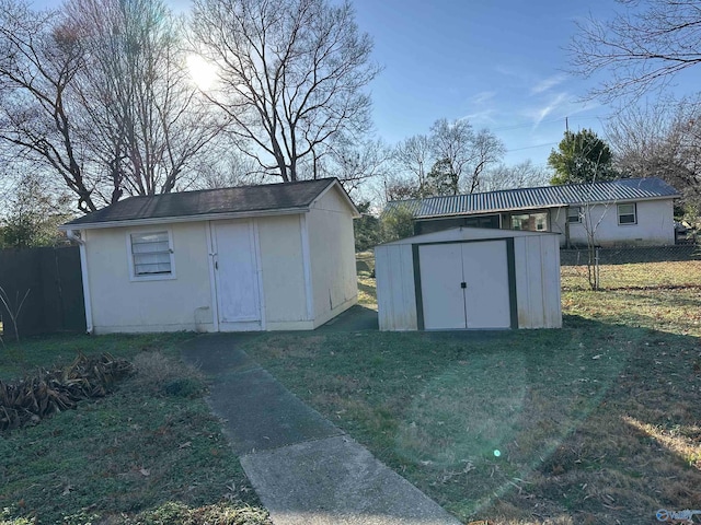 view of outbuilding with a lawn