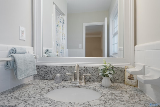 bathroom featuring backsplash and vanity