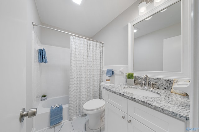 bathroom featuring marble finish floor, tile walls, toilet, shower / bath combo, and vanity