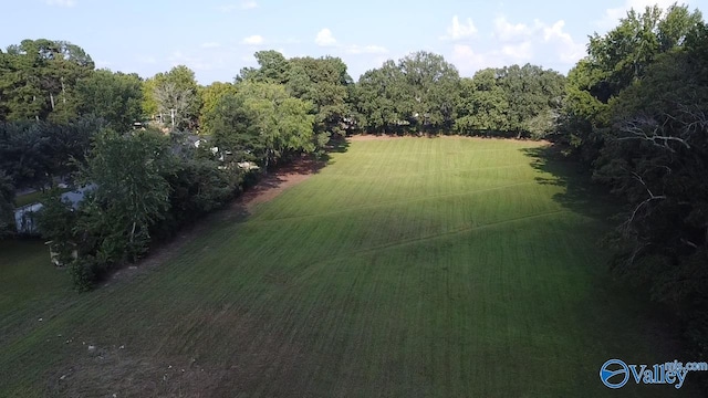 birds eye view of property with a rural view