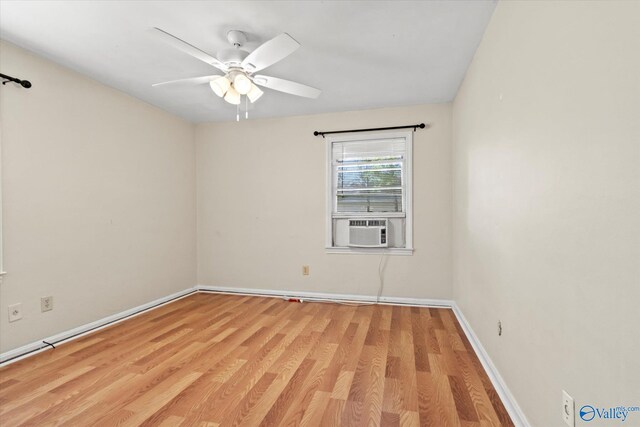 905 Cedar St SW, Decatur, AL 35601 - unfurnished room featuring wood finished floors, baseboards, ceiling fan, and cooling unit