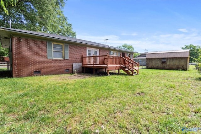 905 Cedar St SW, Decatur, AL 35601 - rear view of property with crawl space, a wooden deck, a yard, brick siding, and stairs