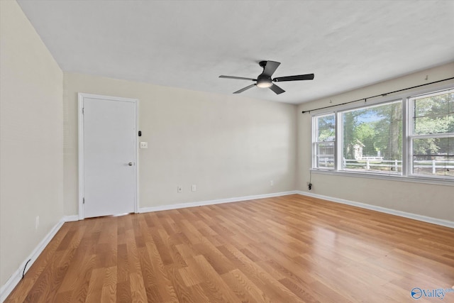 905 Cedar St SW, Decatur, AL 35601 - empty room featuring plenty of natural light, light wood-type flooring, baseboards, and ceiling fan