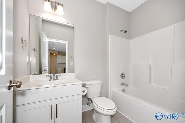 full bathroom with toilet, vanity, washtub / shower combination, and tile patterned floors