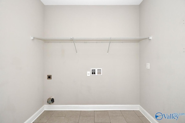 laundry room with washer hookup, laundry area, electric dryer hookup, and baseboards