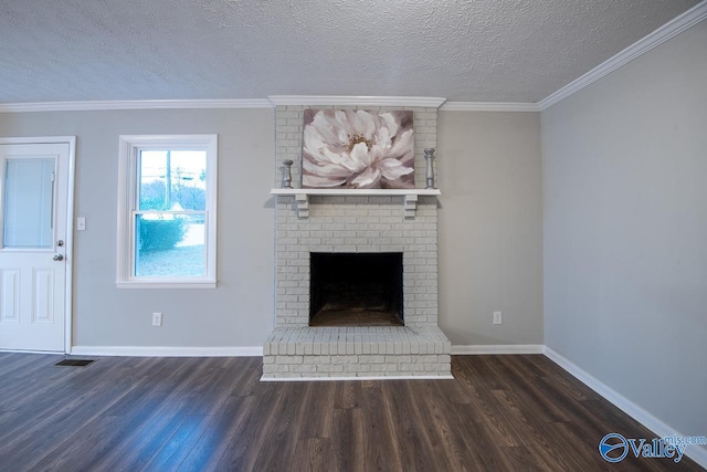 unfurnished living room with dark hardwood / wood-style floors, ornamental molding, a textured ceiling, and a brick fireplace