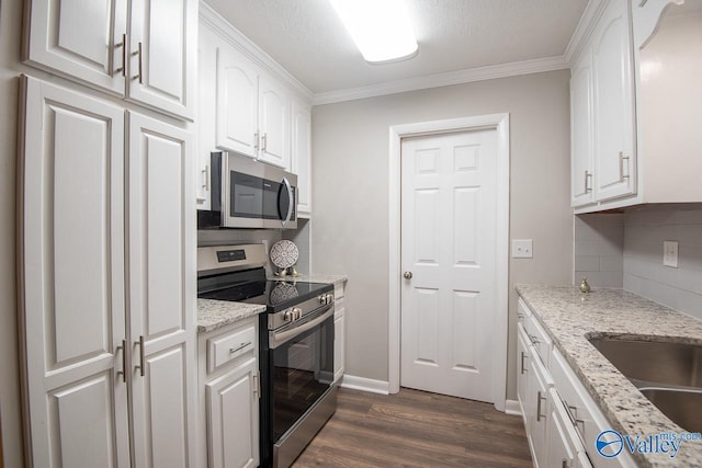 kitchen featuring white cabinetry and stainless steel appliances