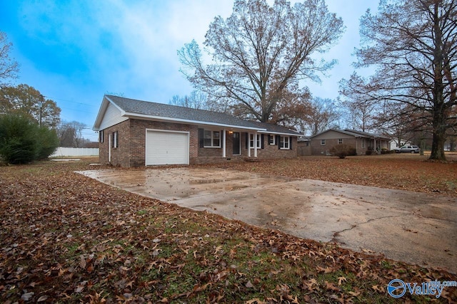 ranch-style home with a garage