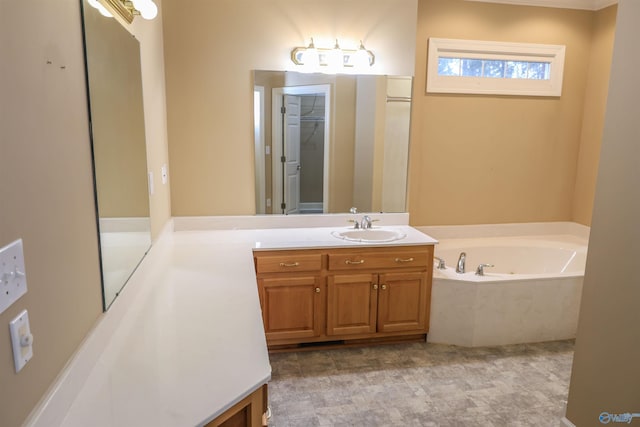 bathroom with vanity and a bathtub