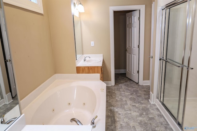 bathroom featuring plus walk in shower and vanity