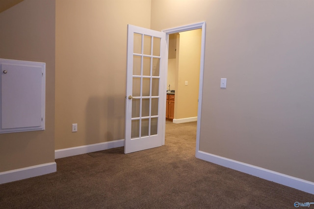 empty room with carpet flooring