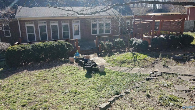 exterior space featuring a wooden deck