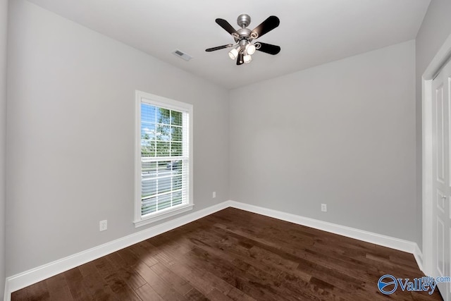 spare room with ceiling fan and hardwood / wood-style floors