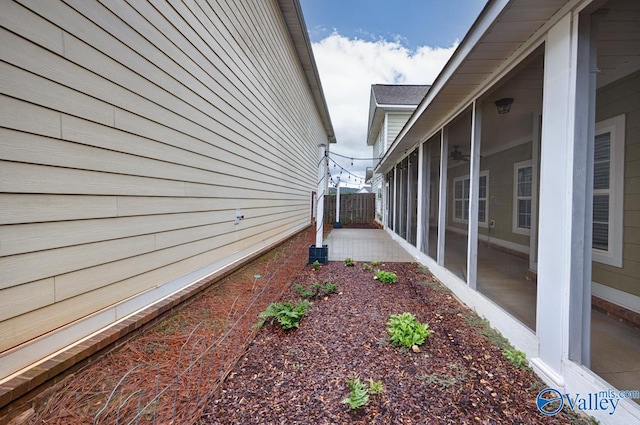 view of yard with a sunroom