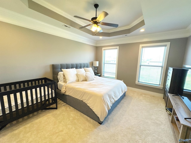 bedroom featuring crown molding, recessed lighting, carpet, and a tray ceiling