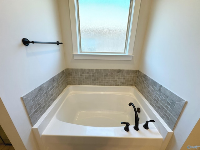 bathroom featuring a bath