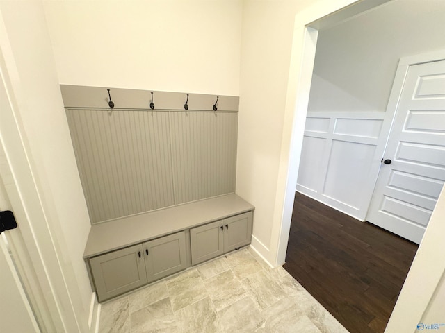 mudroom featuring a wainscoted wall