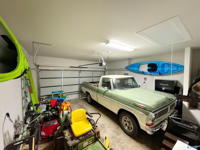 garage featuring a garage door opener
