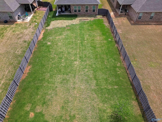 exterior space featuring a fenced backyard