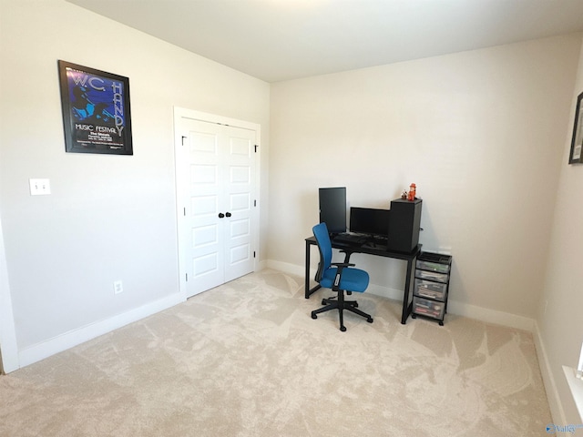 office featuring baseboards and carpet flooring
