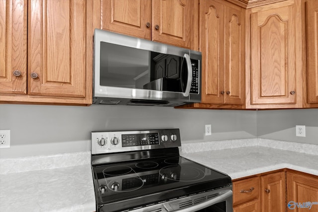 kitchen with appliances with stainless steel finishes