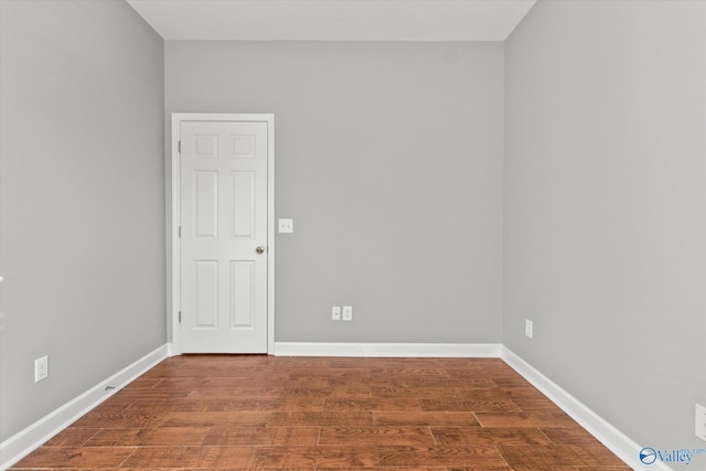 spare room with hardwood / wood-style floors