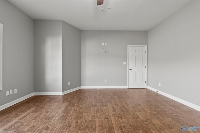 spare room with ceiling fan and hardwood / wood-style floors