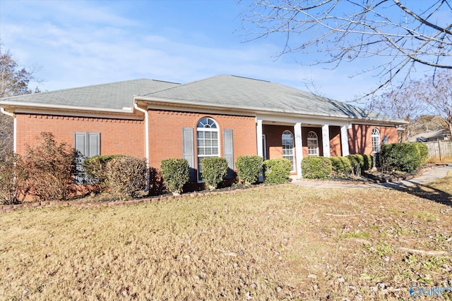 view of front of property with a front lawn