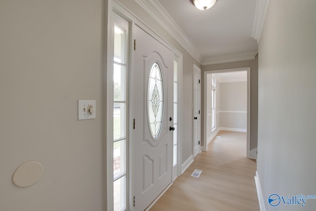 119 Victoria Dr, Madison, AL 35758 - entryway featuring light wood-style floors, crown molding, and baseboards