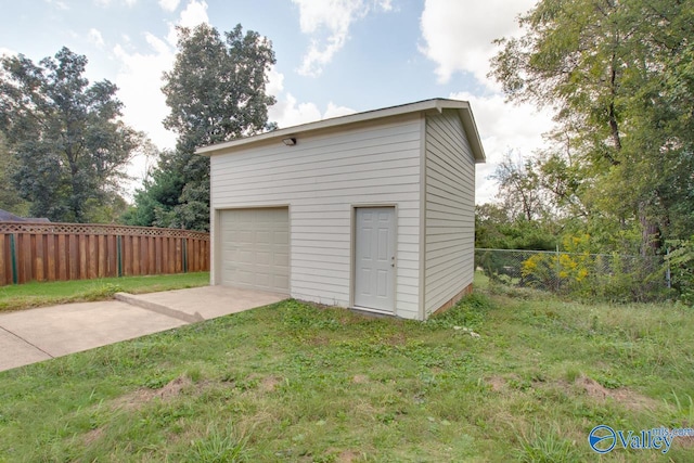 garage with a yard