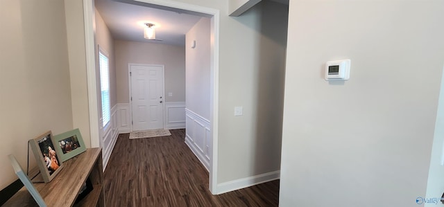 corridor featuring dark hardwood / wood-style floors