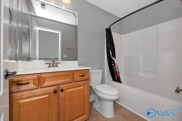 133 Mill Park Ln, Madison, AL 35758 - bathroom with shower / bath combo, tile patterned floors, vanity, and toilet
